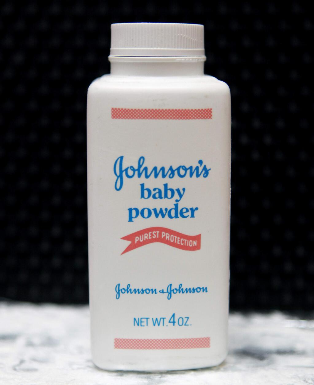 FILE - In this April 15, 2011, file photo, a bottle of Johnson's baby powder is displayed in San Francisco. (AP Photo/Jeff Chiu, File)