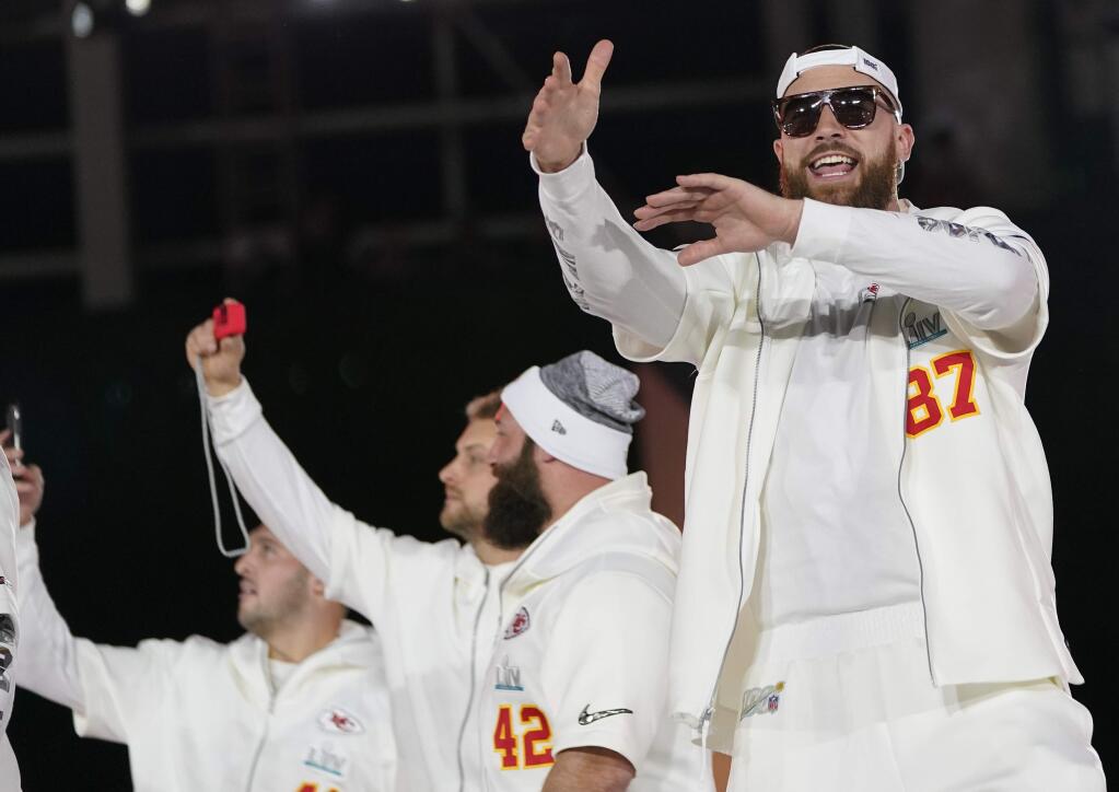 Kansas City Chiefs tight end Travis Kelce arrives with his teammates for Opening Night for Super Bowl LIV Monday, Jan. 27, 2020, at Marlins Park in Miami. (AP Photo/David J. Phillip)