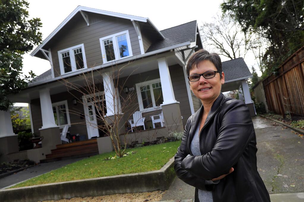 Grace Lucero, director of investment sales inSonoma County for Vanguard Properties, with a Healdsburg home she designed, built and sold in 2016. (John Burgess/The Press Democrat)