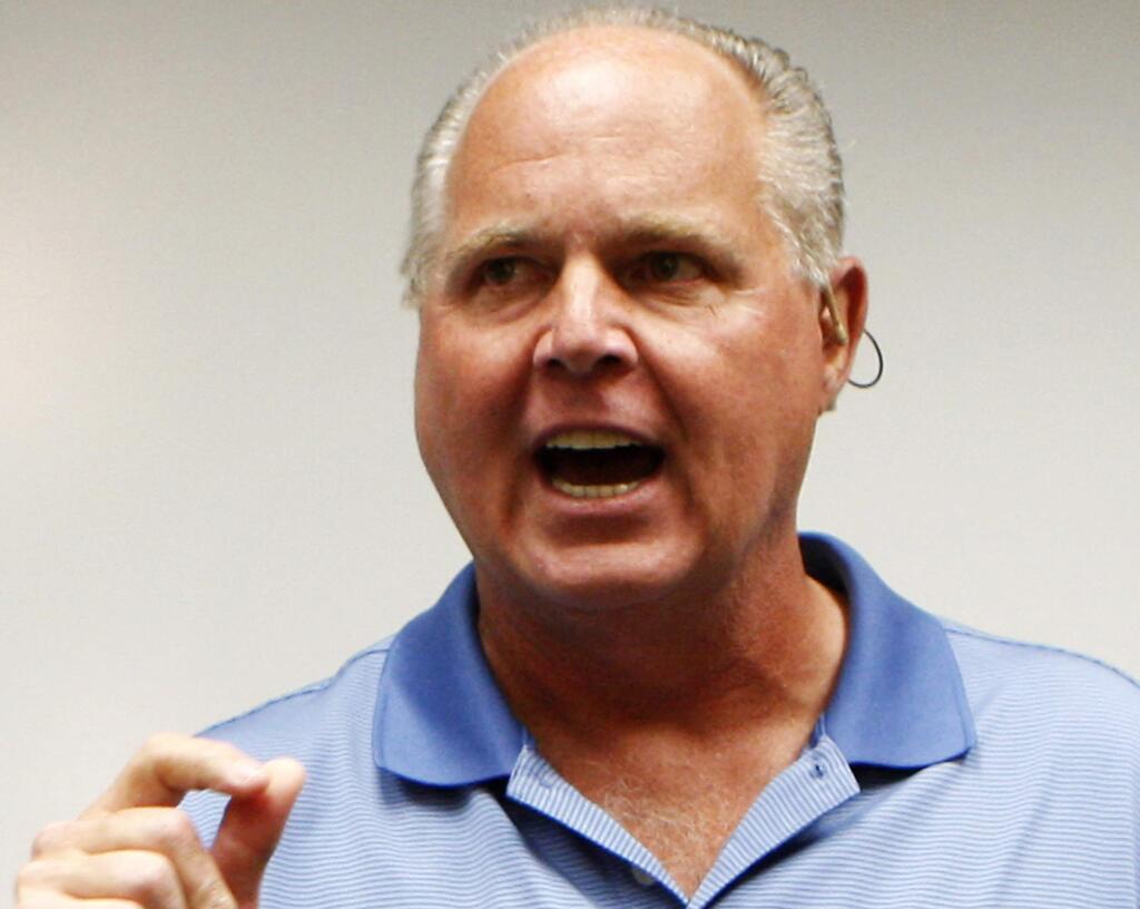Rush Limbaugh's claim that Hurricane Irma is a 'liberal hoax' and a shark swimming flooded streets are just some of the misinformation being spread about the Category 5 storm. (AP Photo/Chris Carlson, file )