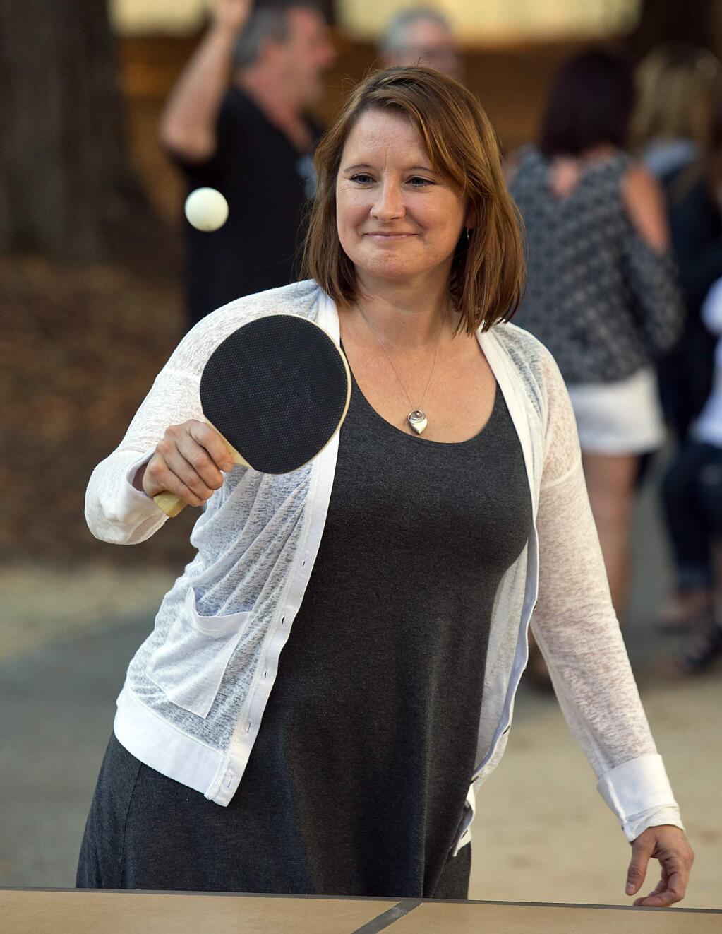 Raeanna Jewel plays ping pong at the Farmster Festival at the Sonoma Mountain Village in Rohnert Park on Saturday.