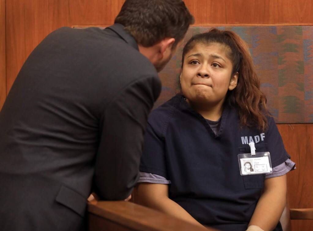 Alejandra Hernandez-Ruiz, the mother of two girls who drowned in a crash in the Petaluma River, confers with her lawyer Izaak Schwaiger during a hearing in Sonoma County Superior Court, Friday Sept. 29, 2017 in Santa Rosa. Hernandez-Ruiz, arrested earlier this week in the deaths of Delilah, 9, and Sayra Gonzalez, 7, was released from custody in part because of her ongoing cancer treatments. (Kent Porter / The Press Democrat)