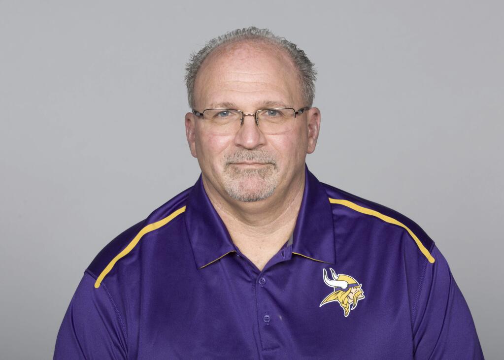 This May 5, 2016 file photo shows Tony Sparano of the Minnesota Vikings. Sparano has died at the age of 56. The Vikings say he died early Sunday, July 22, 2018 but did not give a cause of death. He had been the Vikings' offensive line coach since 2016. Sparano began his NFL coaching career in 1999 and had stints as a head coach with the Miami Dolphins and Oakland Raiders. (AP Photo)