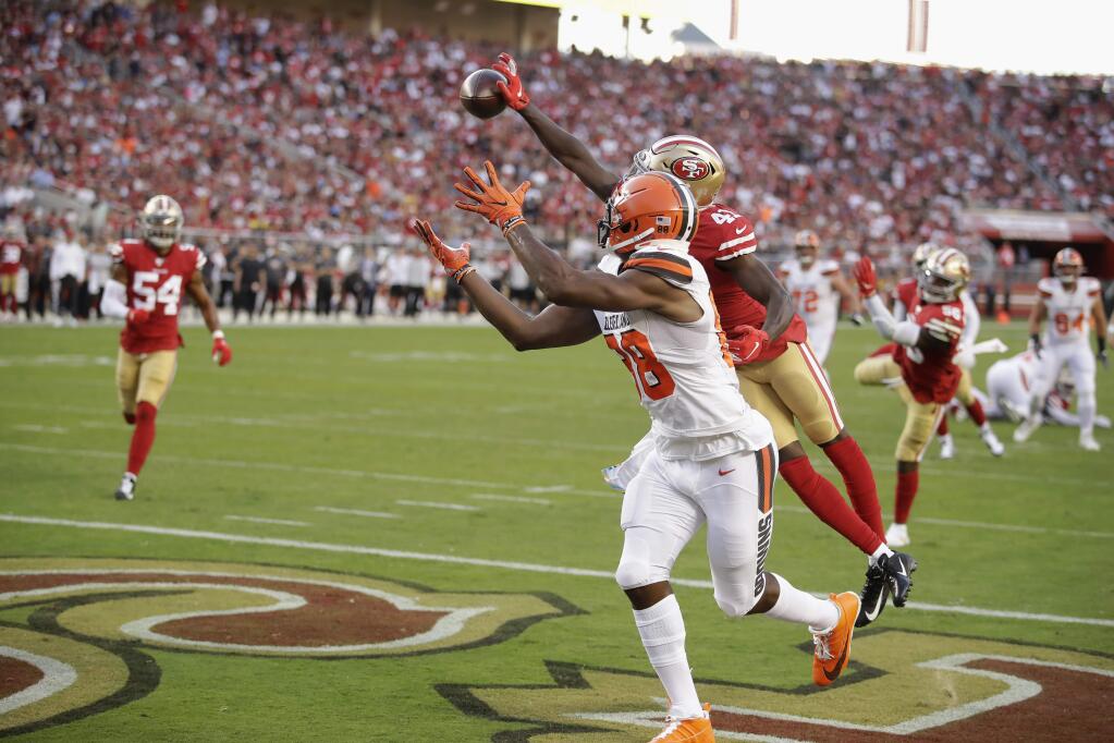 San Francisco 49ers defensive back Emmanuel Moseley, top, breaks up a pass intended for Cleveland Browns tight end Demetrius Harris during the first half in Santa Clara, Monday, Oct. 7, 2019. (AP Photo/Ben Margot)