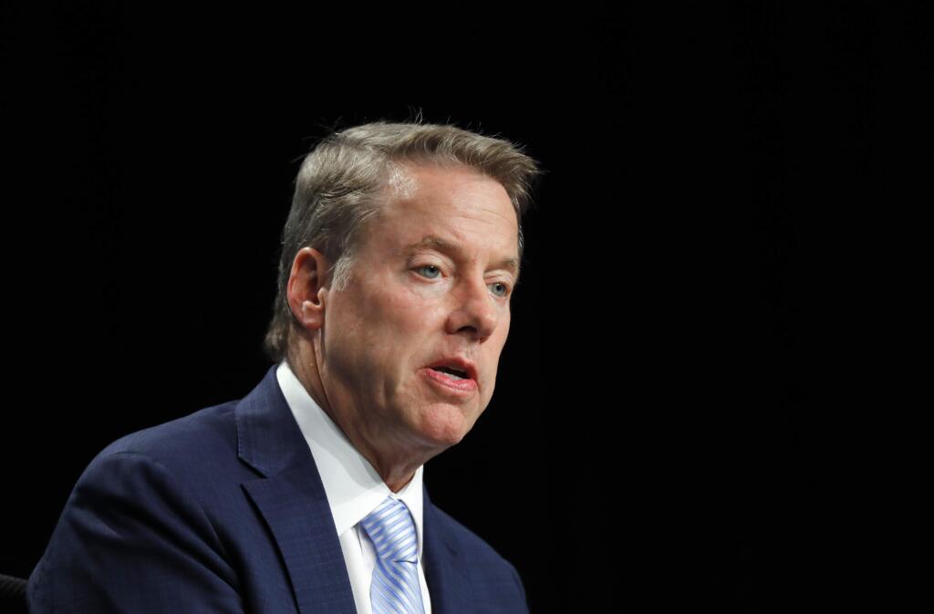 Bill Ford Jr., executive chairman of Ford Motor Company, announces Jim Hackett as CEO, in Dearborn, Mich., Monday, May 22, 2017. Ford is replacing CEO Mark Fields as it struggles to keep its traditional auto-manufacturing business running smoothly while remaking itself as a nimble, high-tech provider of new mobility services. (AP Photo/Paul Sancya)