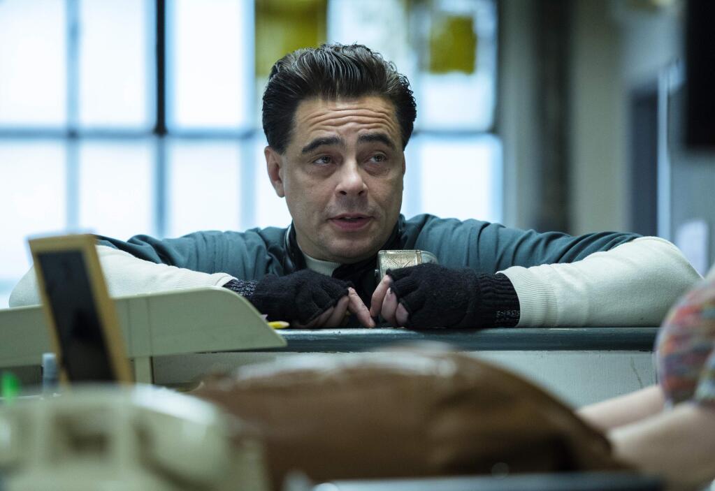 This image released by Showtime shows Benicio Del Toro in a scene from 'Escape at Dannemora.' The program, along with “The Americans” and “The Assassination Of Gianni Versace: American Crime Story,” garnered five nominations in the television category for the 24th annual Critics' Choice Awards. The awards will be presented Jan. 13 on the CW Network. (Christopher Saunders/Showtime via AP)