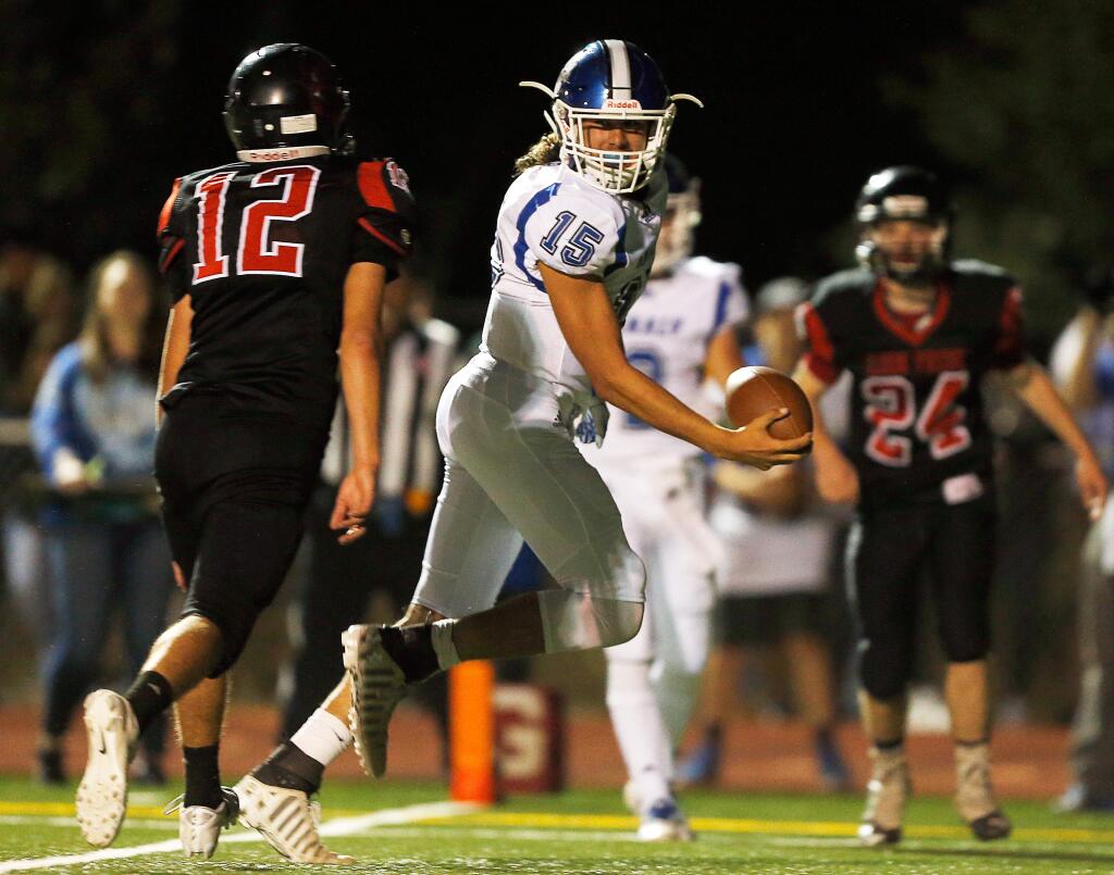 Analy quarterback Nic Visser (15), center, jogs over the goal line to score a touchdown during the first half of a varsity football game between Analy and El Molino high schools, in Forestville, California, on Friday, September 14, 2018. (Alvin Jornada / The Press Democrat)