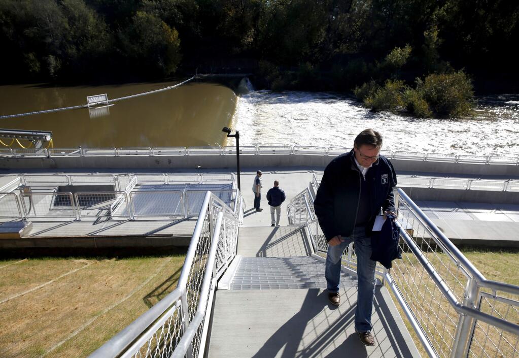 Grant Davis, as general manager of the Sonoma County Water Agency, walks up the steps of the Sonoma County Water Agency's fish ladder and viewing gallery in Forestville, in 2016. Davis left the SCWA briefly to lead the state Department of Water Resources, but resigned to come back to Sonoma County. (BETH SCHLANKER/ The Press Democrat)