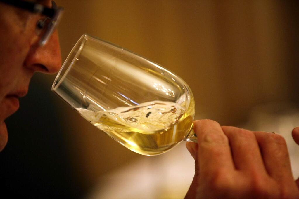 Judge Matt Parish tastes wine during the first North Coast Wine Challenge at the Hilton Sonoma Wine Country Hotel in Santa Rosa, California on Wednesday, May 29, 2013. (BETH SCHLANKER/ The Press Democrat)