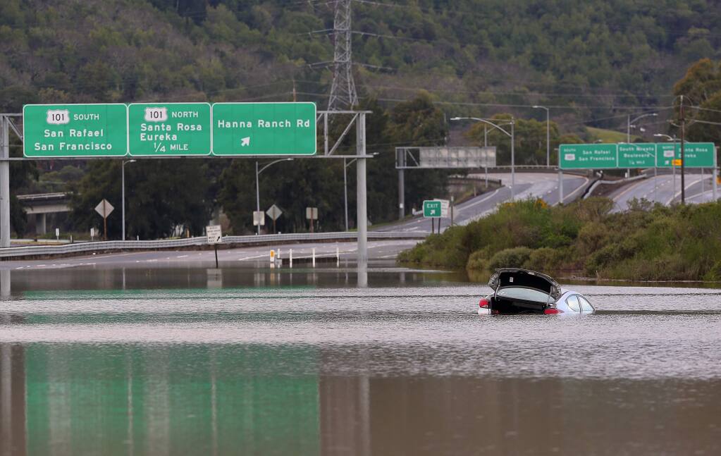 Highway 37 west of the Lakeville Highway was closed due to flooding for the second time this winter, on Feb. 27, 2019. (CHRISTOPHER CHUNG / The Press Democrat)