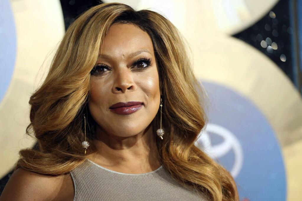 FILE - In this Nov. 7, 2014, file photo, TV talk show host Wendy Williams arrives during the 2014 Soul Train Awards in Las Vegas. Williams gave viewers a scare Tuesday morning when she passed out on-the-air during a broadcast of her syndicated chat show. as introducing a segment while wearing a Statue of Liberty Halloween costume when her speech suddenly became slurred. She began shaking and seconds later collapsed on the stage. Stagehands rushed in to help her while the crowd screamed. (Photo by Omar Vega/Invision/AP, File)