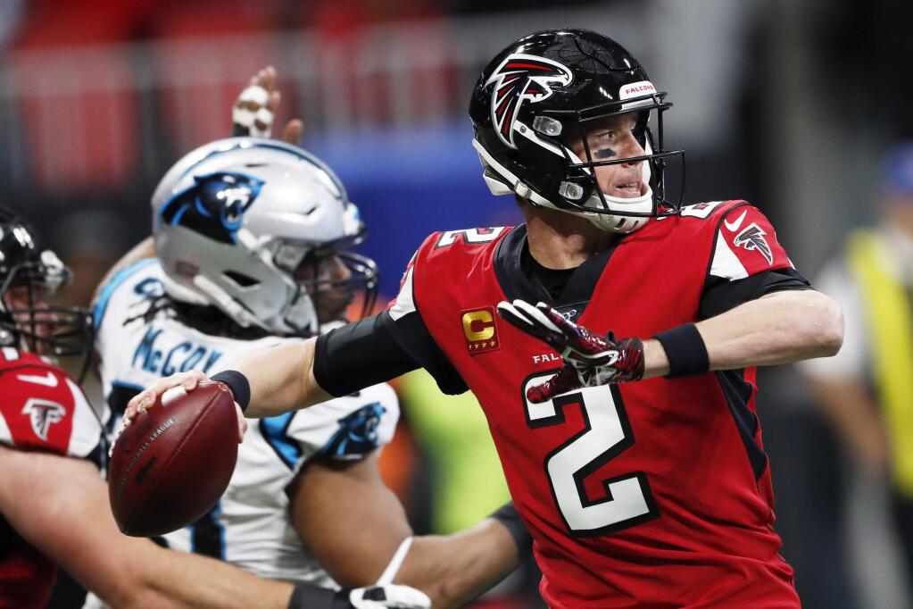 Atlanta Falcons quarterback Matt Ryan works in the pocket against the Carolina Panthers during the first half, Sunday, Dec. 8, 2019, in Atlanta. (AP Photo/John Bazemore)