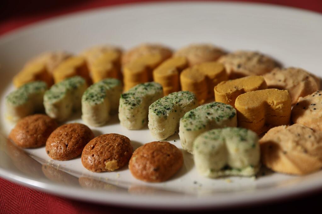 Small cookies are part of a haft sin table put together by Shari Sarabi, chef/owner of Baci Cafe & Wine Bar in Healdsburg, for the Persian New Year, known as Nowruz.(Christopher Chung/ The Press Democrat)