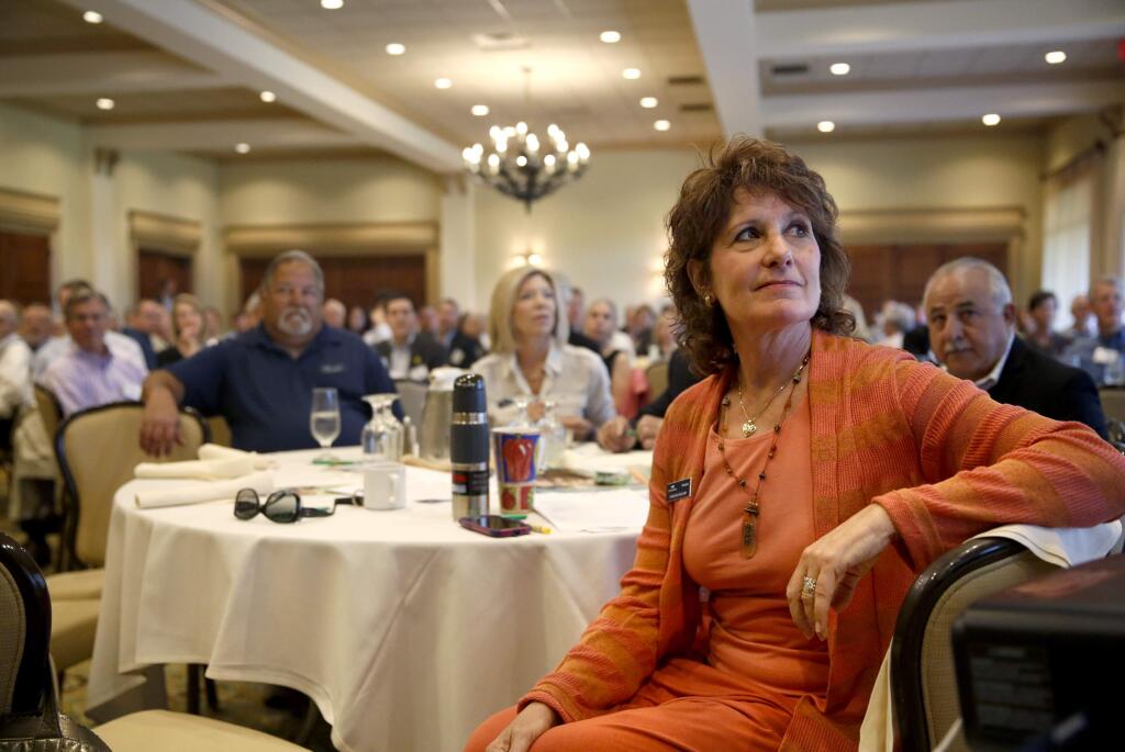 Marlene Soiland, right, then-president of the Sonoma County Alliance, during a monthly general membership meeting at Santa Rosa Golf and Country Club in Santa Rosa, on Wednesday, June 3, 2015. Soiland has agreed to return to leadership until a new Alliance president is selected after the resignation last month of President Doug Hilberman. (Beth Schlanker / The Press Democrat)