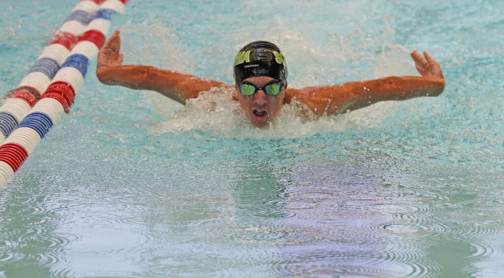Bill Hoban/Index-TribuneSonoma's Dominic Tommasi won the 100 butterfly Friday as the Dragon boys won the Sonoma County League swimming championship. The girls finished second to Analy.