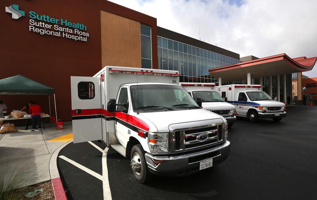 Ambulances line up at the new Santa Rosa Sutter Hospital on Saturday, October 25, 2014. (John Burgess / PD FILE)