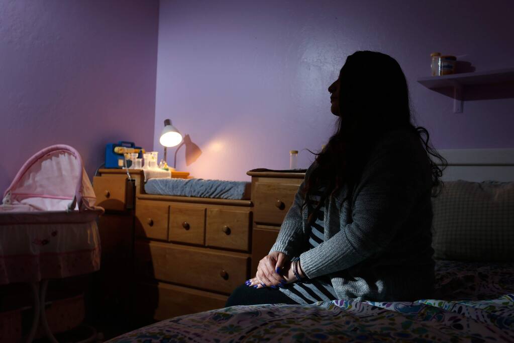 Anni McAnallan sits in the room she stayed in with her newborn son during her addiction recovery at Women's Recovery Services in Santa Rosa, California on Thursday, January 28, 2016. (Alvin Jornada / The Press Democrat)