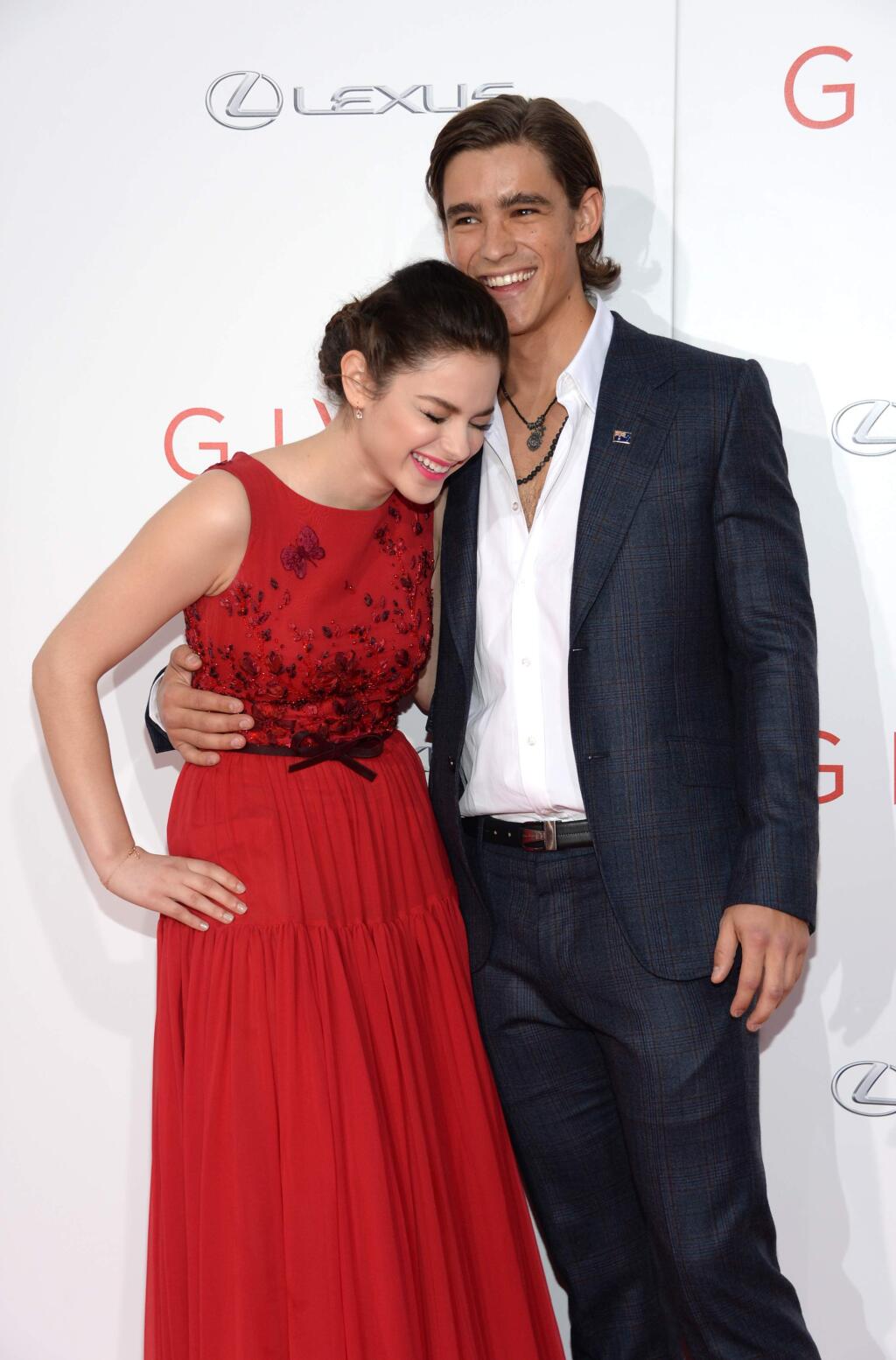 Odeya Rush and Brenton Thwaites arrive at New York premiere of 'The Giver' at the Zeigfeld Theater on Monday, Aug. 11, 2014, in New York. (Photo by Evan Agostini/Invision/AP)