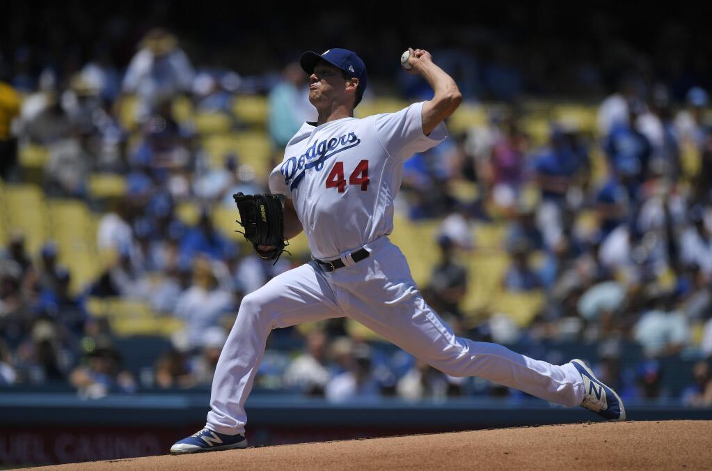 Los Angeles Dodgers starting pitcher Rich Hill throws to the plate during the first inning of a baseball game against the San Francisco Giants, Saturday, July 29, 2017, in Los Angeles. (AP Photo/Mark J. Terrill)