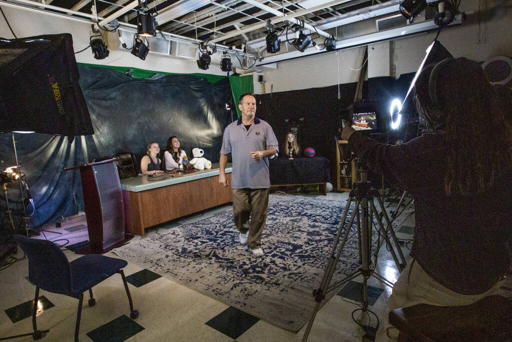 Media arts teacher Peter Hansen walks through the state-of-the-art TV studio before rehearsals begin for the weekly Dragoncast broadcast at Sonoma Valley High School on Friday, Sept. 16, 2022. (Robbi Pengelly/Index-Tribune)