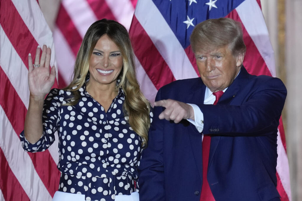 Former President Donald Trump and his wife Melania greet supporters, after Trump announced a third run for president at Mar-a-Lago in Palm Beach, Fla., Tuesday, Nov. 15, 2022. (AP Photo/Rebecca Blackwell)