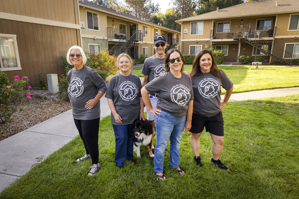 Copeland Creek Tenants Steering Committee members, from left, Elizabeth Snow; Joy Oliver; Albert Papp with his dog, Abby; Lynn Pedone and Daniella Bonovitch help negotiate for improved conditions at the low-income senior apartment complex in Rohnert Park. (John Burgess / The Press Democrat)
