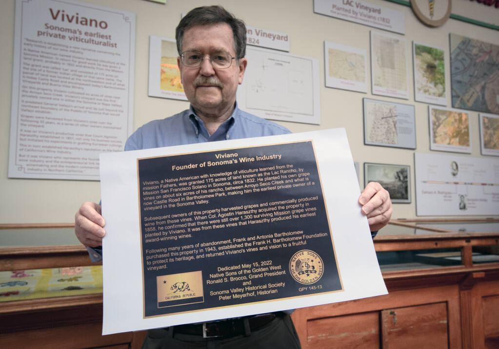 Pictured on June 3, 2022, at the Deport Park Museum, historian Peter Meyerhof with a photo of the plaque that will be installed honoring Viviano, the first vintner in Sonoma Valley. An exhibit at the museum tells his story. (Robbi Pengelly/Index-Tribune)