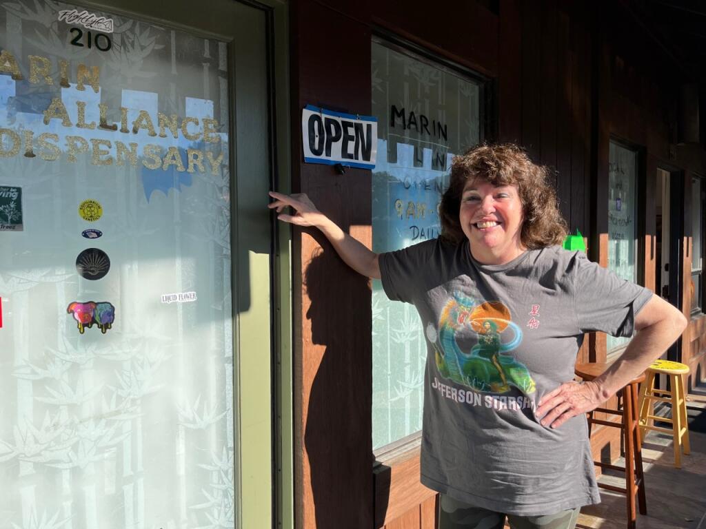 Lynnette Shaw, founder of Marin Alliance CBC, was a pioneer in the formation of Proposition 215. Here she stands in front of the dispensary in Fairfax, Marin County,  on Nov. 13. (Susan Wood / North Bay Business Journal)