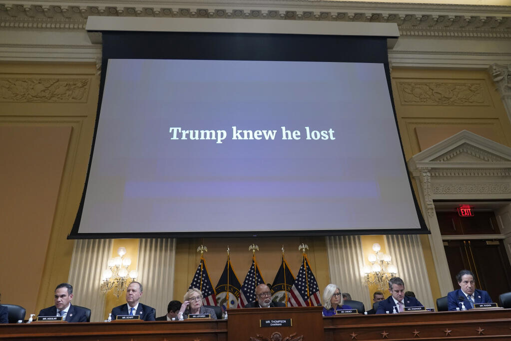 A video presentation plays as the House select committee investigating the Jan. 6 attack on the U.S. Capitol holds its final meeting on Capitol Hill in Washington, Monday, Dec. 19, 2022. (AP Photo/Jacquelyn Martin)
