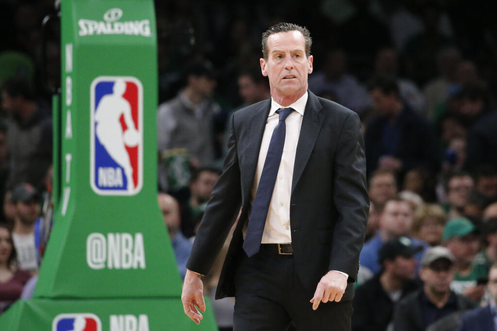 Brooklyn Nets head coach Kenny Atkinson looks on during a timeout in the first half of an NBA basketball game against the Boston Celtics, Tuesday, March 3, 2020, in Boston. (AP Photo/Mary Schwalm)