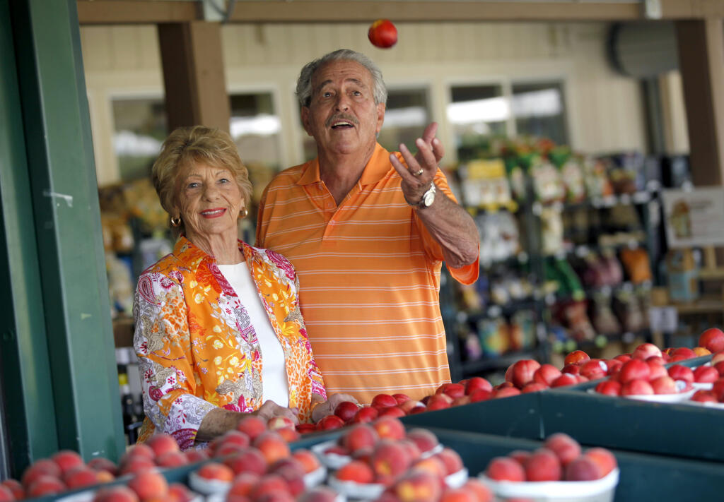 Andy and Katie Skikos, founders of Andy's Produce Market in Sebastopol, celebrated the produce market’s 50th anniversary in 2014. Kathrin died in 2016, and Andy died on March 18, 2022, at age 88. (Beth Schlanker / The Press Democrat, 2013)