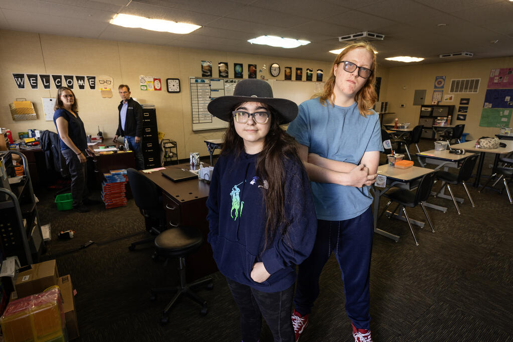 Anova Center for Education students Valentina Irving, 17, and Aidan Krawchuk, 16, right, were moved into portables in the Luther Burbank Center parking lot after their school was burned in the Tubbs Fire in 2017. The enclosed, dimly lit rooms with constant vibrations coming through the floor creates a difficult environment for children with autism. Photo taken Thursday, July 27, 2023. (John Burgess / The Press Democrat)