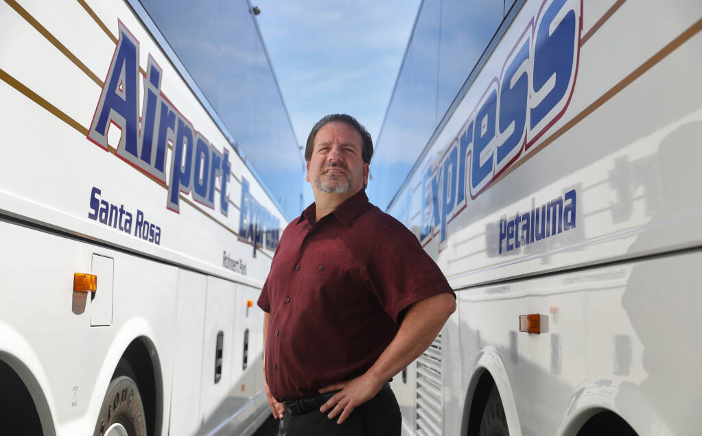 Anthony Geraldi, general operations manager of Airport Express, is looking forward to resuming service from Santa Rosa to the San Francisco and Oakland airports on Monday.  (Christopher Chung/ The Press Democrat)