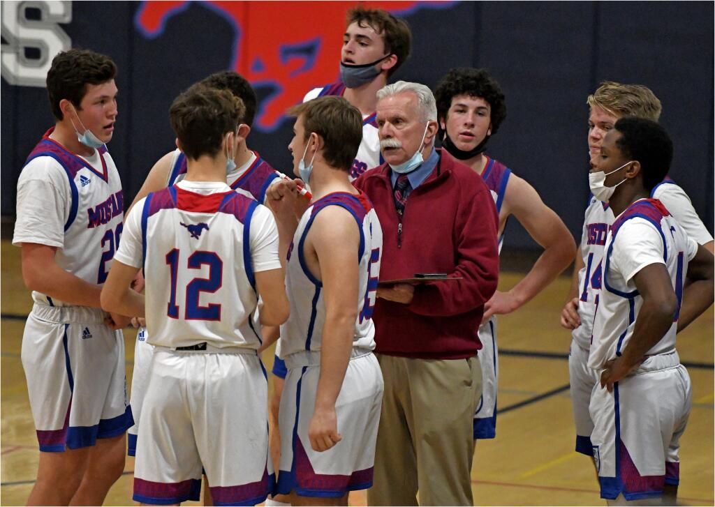 St. Vincent coach Tom Bonfigli addresses his team before the Mustangs played Elsie Allen in 2021. (SUMNER FOWLER / FOR THE PETALUMA ARGUS -COURIER)