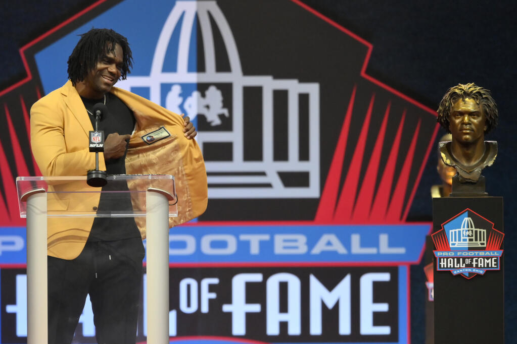 Edgerrin James, a member of the Pro Football Hall of Fame Centennial Class, speaks during the induction ceremony on Saturday, Aug. 7, 2021, in Canton, Ohio. (David Richard / ASSOCIATED PRESS)