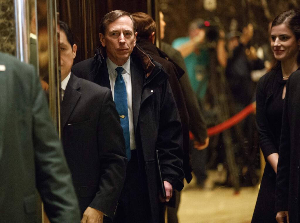Former CIA director retired Gen. David Petraeus gets on an elevator after arriving at Trump Tower for a meeting with Presiden-elect Donald Trump, Monday, Nov. 28, 2016, in New York. (AP Photo/ Evan Vucci)