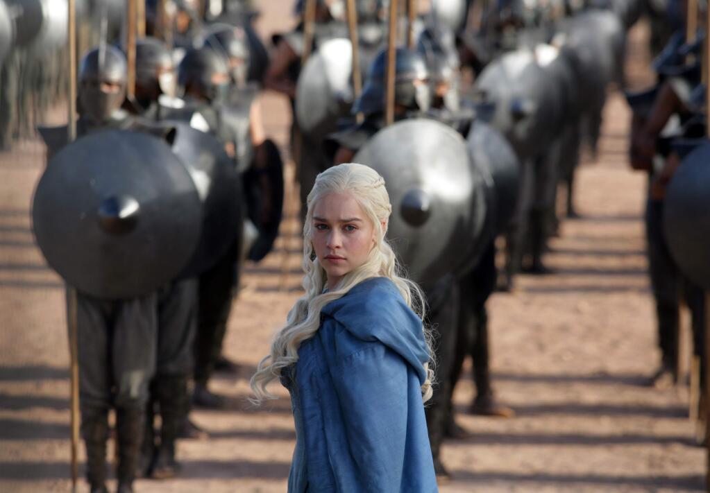 FILE - This file publicity image released by HBO shows Emilia Clarke as Daenerys Targaryen in a scene from 'Game of Thrones.' HBO plans to offer a stand-alone version of its popular video-streaming service, CEO Richard Plepler said at an investor meeting at parent Time Warner Inc. on Wednesday, Oct. 15, 2014. (AP Photo/HBO, Keith Bernstein, File)
