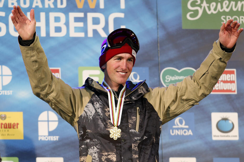 Kyle Smaine from the U.S. celebrates his gold medal at the men's freestyle ski half pipe event at the Freestyle Ski and Snowboard World Championships in Kreischberg, Austria, Jan. 22, 2015. Smaine died after getting buried in an avalanche in the mountains of central Japan over the weekend. The U.S. Freeski team posted on social media about the 31-year-old American’s death. (AP Photo/Darko Bandic, file)