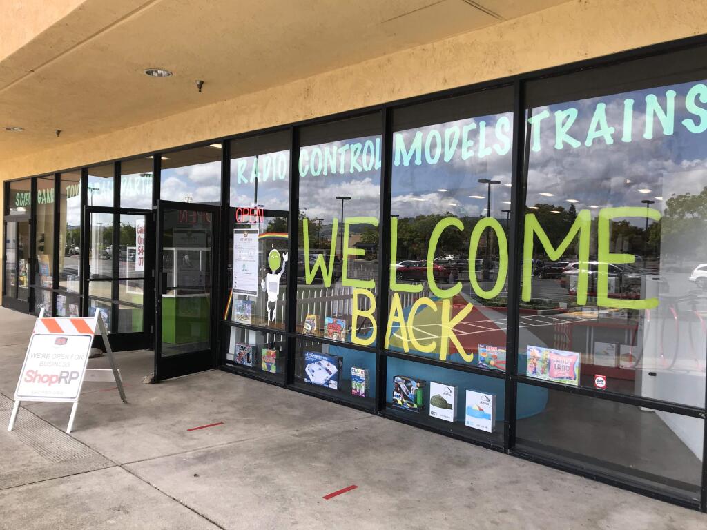 Fundemonium of Rohnert Park uses its 60-foot-long storefront to welcome back customers, as 'nonessential' retail stores are allowed to reopen in Sonoma County in May after a two-month lockdown during the coronavirus pandemic. (Photo by Steve Elliott)