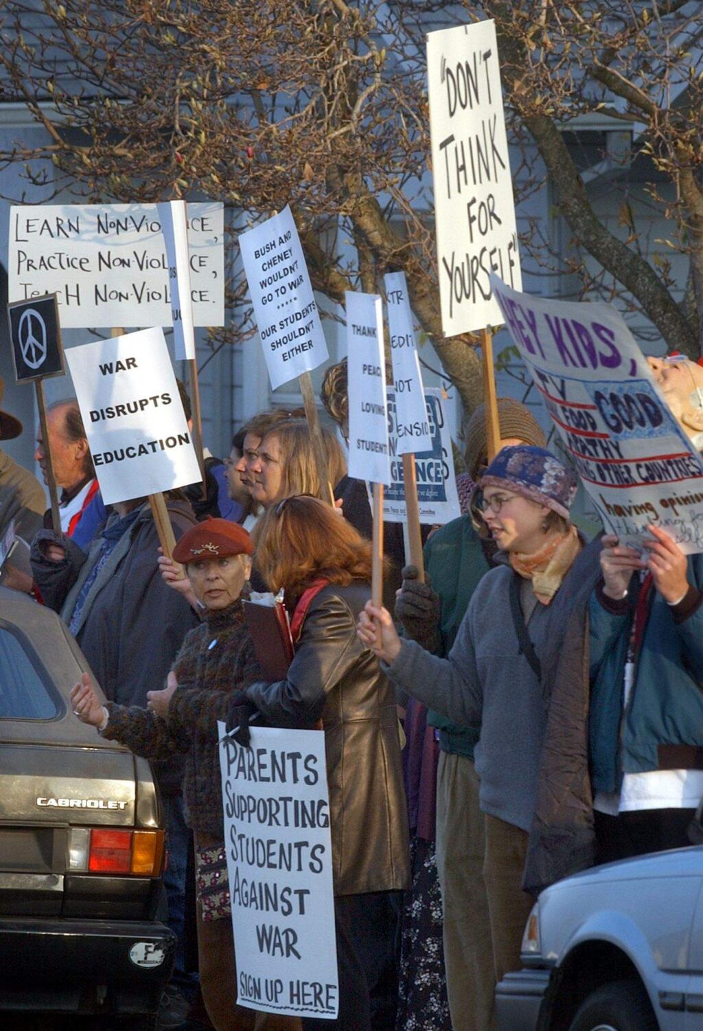 Parents protest Wednesday, Dec.5, 2002, outside Petaluma High School after students were suspended for leaving during a recent anti war rally.PHOTO FROM THE PRESS DEMOCRAT