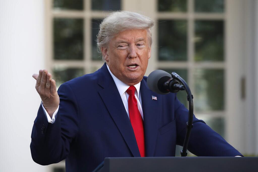 President Donald Trump speaks about the coronavirus in the Rose Garden of the White House, Monday, March 30, 2020, in Washington. (AP Photo/Alex Brandon)