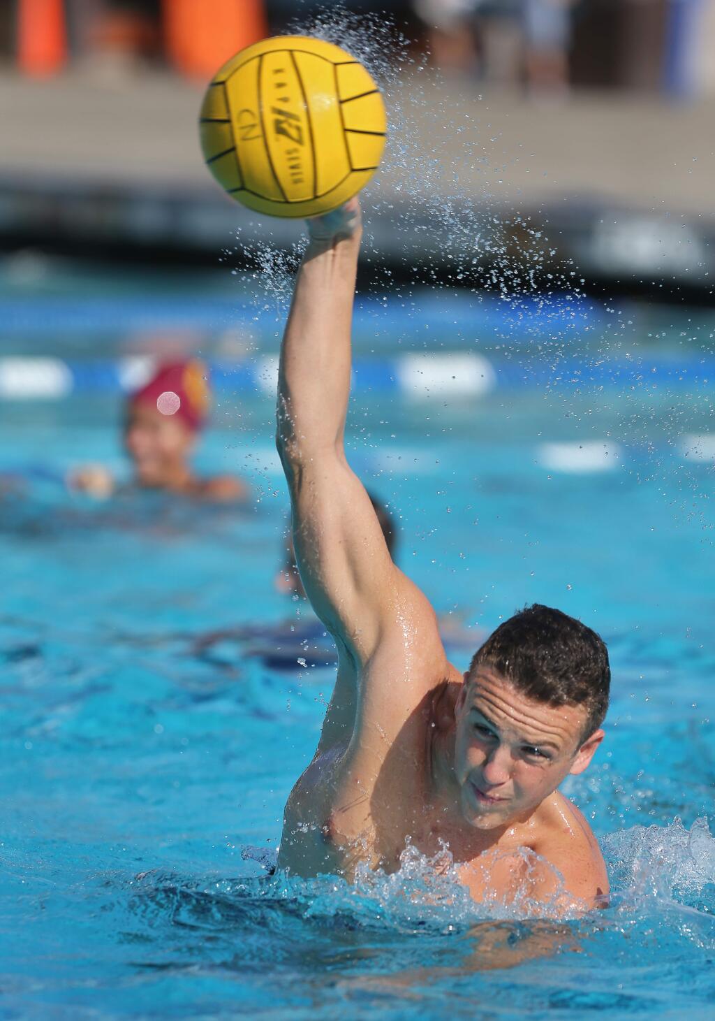 Cardinal Newman water polo player Bennett Stafford takes a shot on goal during practice in Santa Rosa on Monday, Sept. 16, 2019. (Christopher Chung / The Press Democrat)