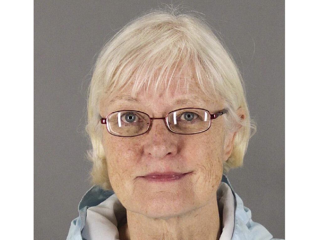 Federal law enforcement officials say Marilyn Hartman tried at least three times to breach airport security before she was able to get through a checkpoint without a boarding pass at Mineta San Jose International Airport on Monday, Aug. 4, 2014. She was arrested for unknown reasons at the Los Angeles airport on Thursday, Aug. 7. (AP Photo/San Mateo County Sheriff's Office)