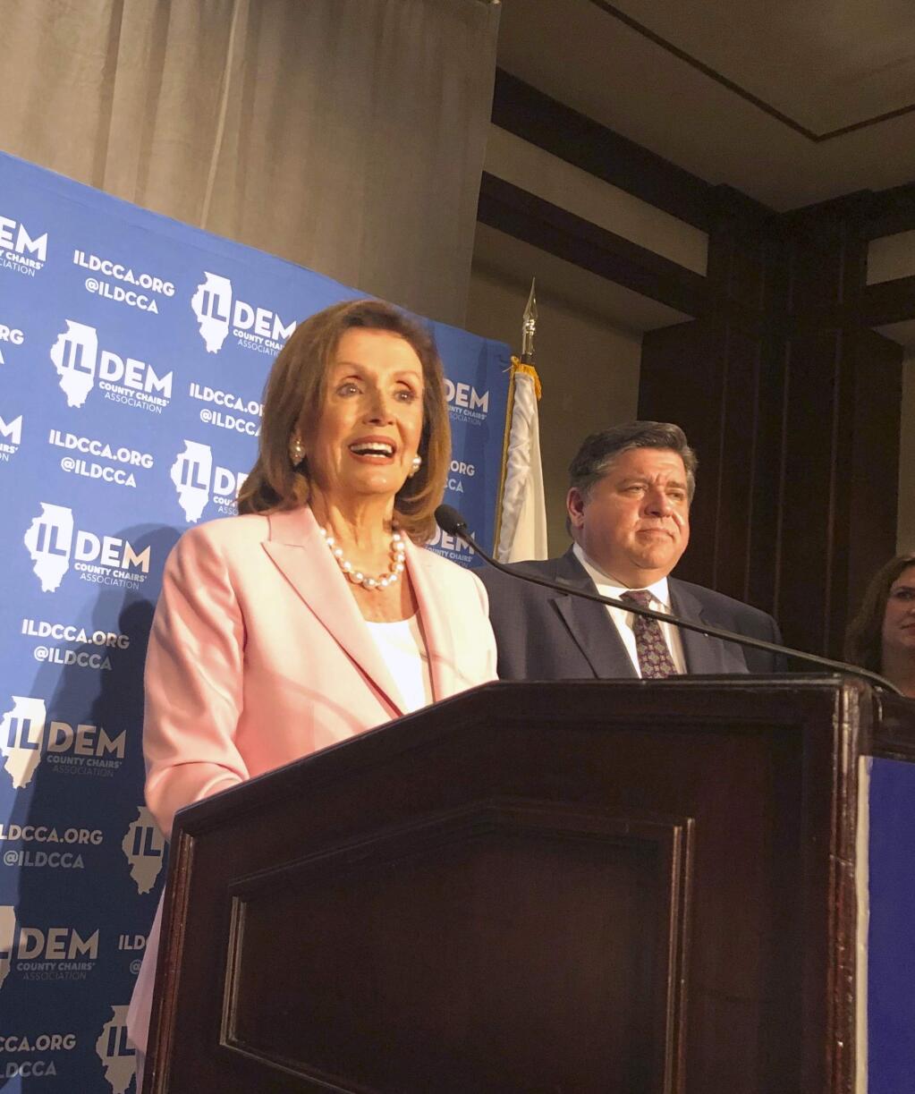 U.S. House Speaker Nancy Pelosi answers reporters' questions after keynoting the Illinois Democratic County Chairs' Association brunch Wednesday, August 14, 2019 at the Illinois State Fair in Springfield. The California Democrat exhorted about 2,200 Democrats at the event to defeat Republican President Donald Trump and give Democrats a U.S. Senate majority in 2020. (AP Photo/John O'Connor)