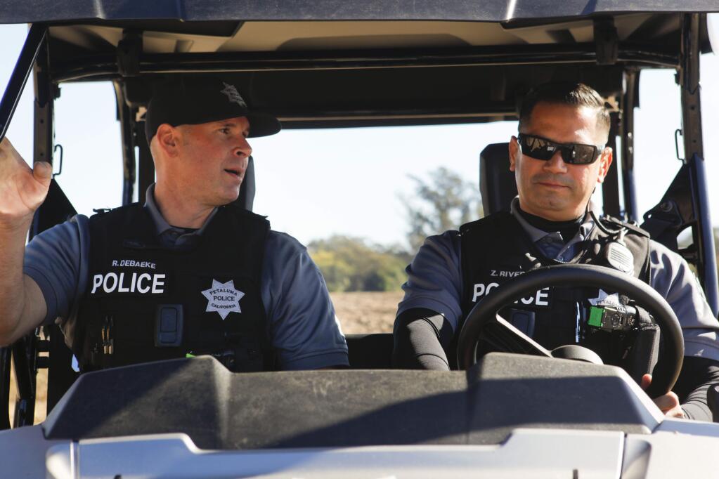 Petaluma, CA, USA. Monday, October 30, 2017._ Officers Ryan DeBaeke and Zilverio Zeuss Rivera work the HOST (Homeless Outreach Services) beat in Petaluma. Recently they acquired another ATV to patrol rough undeveloped roads near areas by the Petaluma River and Lynch Creek. (CRISSY PASCUAL/ARGUS-COURIER STAFF)