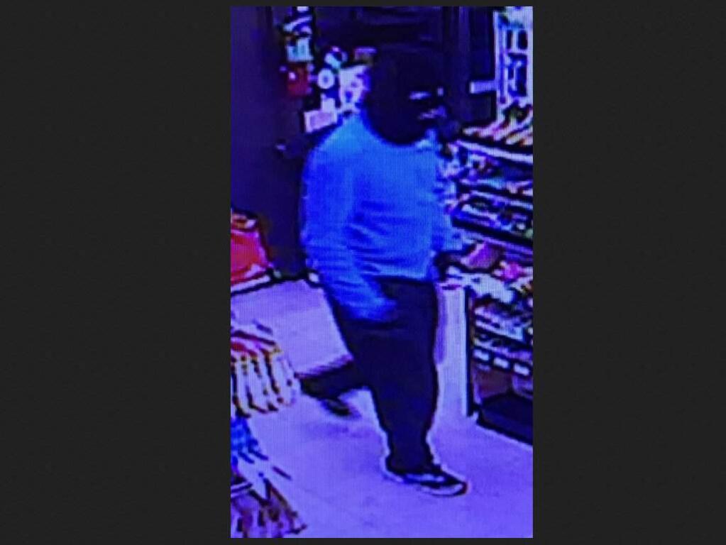 Petaluma police say a masked, armed man entered a 7-Eleven on Washington Street in Petaluma, pointed a gun at a clerk and demanded cash, early Monday, Nov. 28, 2016. (COURTESY OF PETALUMA POLICE DEPARTMENT)