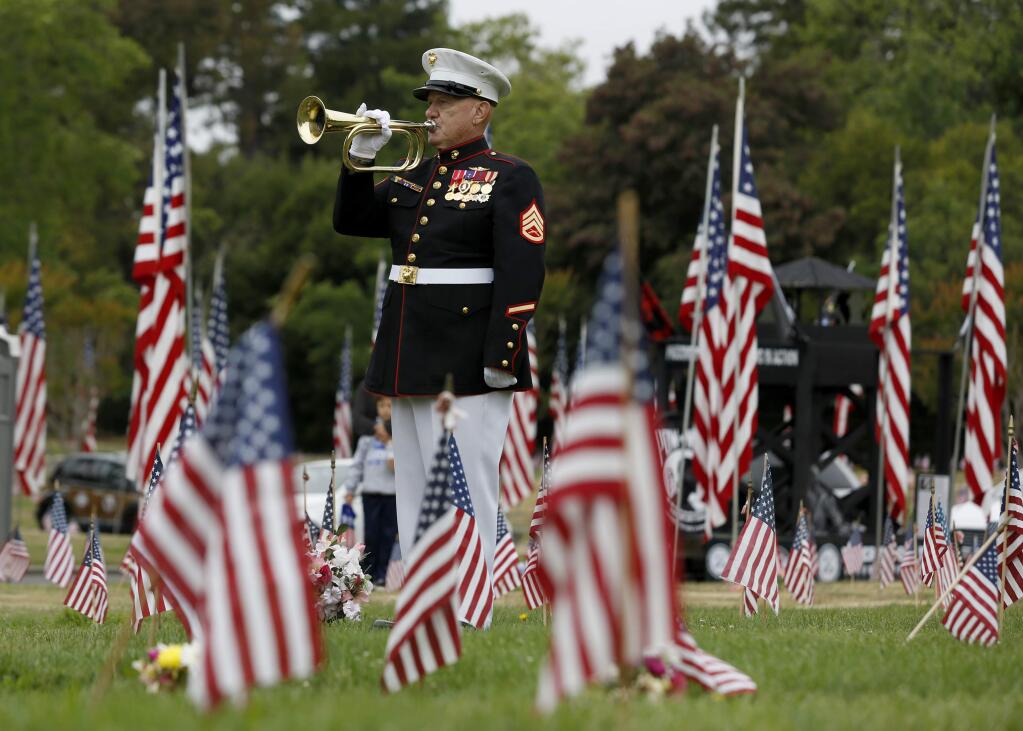 Avenue of the Flags ceremony at Santa Rosa Memorial Park in Santa Rosa. (BETH SCHLANKER / The Press Democrat, 2015)