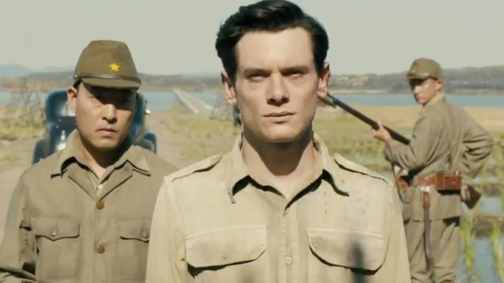 Jack O'Connell plays Olympic runner Louie Zamperini and the true story of the suffering he experienced in Japanese internment camps during World War II. (UNIVERSAL PICTURES)