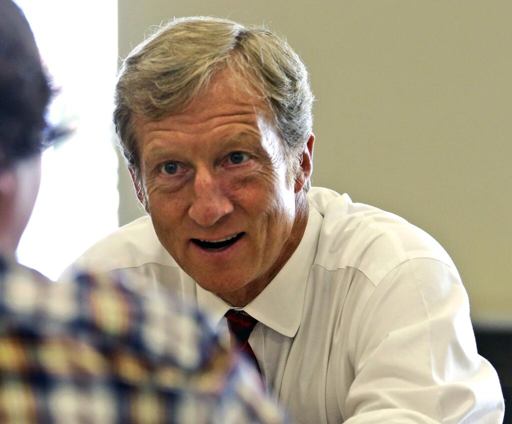 FILE - In this Sept. 25, 2013, file photo, businessman Tom Steyer talks during a meeting to announce the launch of a group called Virginians for Clean Government at Virginia Commonwealth University in Richmond, Va. Steyer electrified the political world with his promise to raise and spend as much as $100 million to make climate change an issue in this yearís midterm elections. The former hedge fund manager is running out of time. On pace to raise far less money, Steyerís group has a relatively minor presence on the air. He now says his biggest impact will be an old-fashioned, get-out-the-vote ground game. (AP Photo/Steve Helber, File)