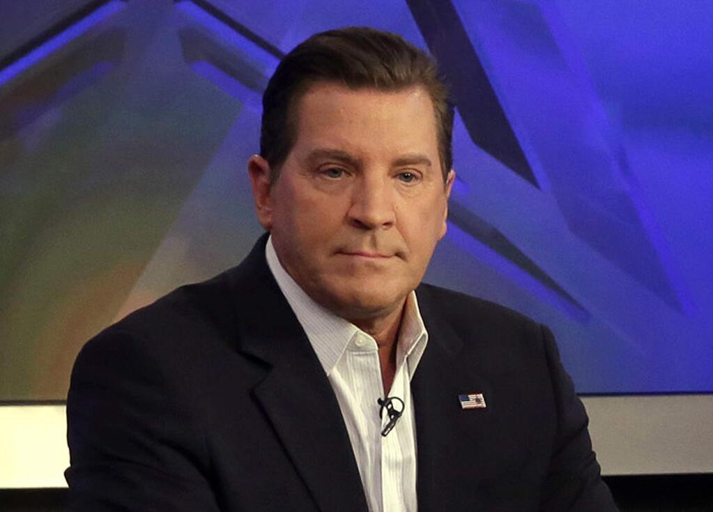 FILE - In this July 22, 2015, file photo, co-host Eric Bolling appears on 'The Five' television program, on the Fox News Channel, in New York. Bolling is suing the reporter who broke the story that he allegedly sent lewd text messages to colleagues. Bolling filed a $50 million defamation lawsuit Wednesday against Yashar Ali, a Huffington Post contributing writer. (AP Photo/Richard Drew, File)